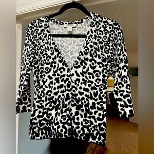 Leopard print White House Black Market 3/4 sleeve cardigan.